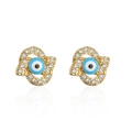 Macro detail of 18K gold plated Hamsa Hand earrings with zircon and blue evil eye inlay - 41951/Hamsa Hand Evil Eye