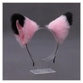 Pink and black plush cat ear headband accessory for Lolita cosplay on display - One Size
