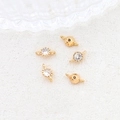Macro shot of five gold-plated circular zircon connectors for DIY jewelry making and crafts - 9# Connector (Double Loop)
