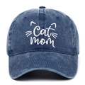 Close-up of white Cat Mom embroidery and whisker details on navy blue washed denim cap - One Size / Navy Blue