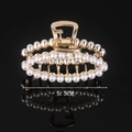Detail view of gold pearl hair claw clip measuring 5.5cm with elegant crystal accents - Full Pearl Oval 5.5CM Claw Clip