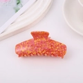 Elegante pinza per capelli grande in acetato con motivo marmoreo colorato e finitura liscia - Corallo