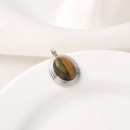 Elegant tiger eye stone pendant with silver metal bezel on white silk background - Type D Oval / White Gold