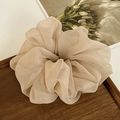 Elegant oversized beige organza scrunchie displayed on a dark wood tray for styling - Milk Tea Coffee