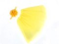 Detailed flat lay of yellow chiffon tutu skirt and matching floral headband set for babies - Top And Bottom / Yellow
