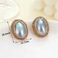 Vintage style oval stud earrings with pearl and champagne rhinestones, 28.3mm size - K-0840 Mabe Pearl Oval Stud Earrings (Small)