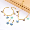 Set gioielli con fiori in smalto blu e farfalla inclusi collana, bracciale ed orecchini - Collana + Bracciale + Orecchini