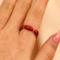 Unique red enamel modular ring in golden finish worn on finger for a stylish look - KC Gold Bamboo Style