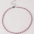 Detail of silver tennis necklace with red and white stones and lobster clasp - Rose Red Necklace-Platinum