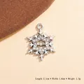 Silver snowflake pendant with white rhinestones measuring 2.1cm by 1.6cm and 1.3g - Silver Snowflake Style 4