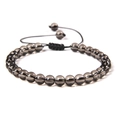 Detail of 6mm stone bead bracelet featuring adjustable black braided cord and smooth beads - 6mm / Smoky Quartz