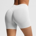 White seamless high-waist fitness shorts with scrunch butt lift and ribbed knit fabric - Feather Beige