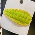 Handmade grass green knitted hair clip with gold trim on a white display card - 14# Green Water Drop