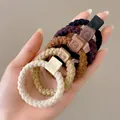 5-pack earth tone elastic hair ties with woven texture and cute bear tags in high ponytail style - Bear Style