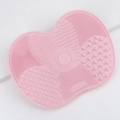 Pink heart-shaped silicone makeup brush cleaning mat with various textured surfaces - Small / Light Pink