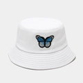 White cotton bucket hat featuring detailed blue butterfly embroidery for women and men - White