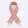 Close-up of bohemian paisley jacquard bag strap with gold metal hooks and buckle - Watermelon Pink
