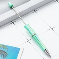 DIY beadable ballpoint pen in metallic iridescent green finish with customizable beads - Candy Mint Green Gradient