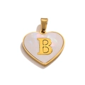 Detailed close-up of a heart pendant with gold letter B and white pearlescent inlay - Letter B / Gold