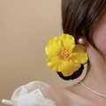 Detailed close-up of a realistic yellow hibiscus hair clip worn by a female model - 17# Duckbill Clip - Yellow Hibiscus Style