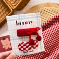 Detailed view of red woven bow hair clips and patterns on a handmade gift card - Red Cherry & Knit Bow Set 2Pcs