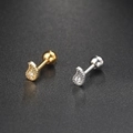 Detail of gold and silver teardrop zircon cartilage studs with spherical screw backs - Wave Drop