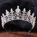 Detail of baroque crown with AB rainbow rhinestones on a textured black mesh and wood background - Baroque Silver AB Rhinestones