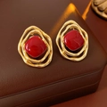 Detail of vintage gold textured rhombic earrings with glossy red resin centerpiece - Silver Needle / Red