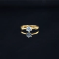Elegant six-prong solitaire ring with round moissanite in a classic gold setting - US 5 / Gold