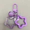 Purple acrylic star keychain pendant with matching bell and D-shaped clasp accessory - Purple