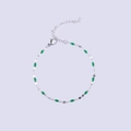Detail of silver stainless steel chain bracelet with green enamel olive beads and clasp - Steel + Dark Green