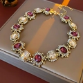 Set gioielli vintage dorati con cristalli viola e gialli su scatola beige - Collana - Oro - Viola