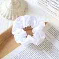 Elegant white satin silk scrunchie with glossy finish for hair and wrist styling - White