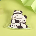 Cute transparent acrylic panda pin with three stacked bears on a fresh green background - Stacking Pandas