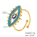 Detail eines blauen Evil Eye Rings mit Goldplattierung, 14mm Durchmesser und Öl-Tropf-Verfahren - Größe 7 (Einstellbar) / Gold
