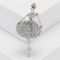 Elegant silver ballet dancer brooch with sparkling rhinestones on minimalist white display - Silver
