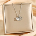 Elegante schelpvormige ketting met micro-diamanten en een witte parel in zilveren afwerking - Zilveren Schelpparel (8699)