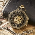 Vintage bronze octagonal skeleton pocket watch with Roman numerals and matching chain - Brown