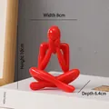 Abstract thinking man sculpture in glossy red resin finish, size 10x8x6.4 cm - D-Style Red