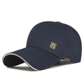 Navy blue cotton baseball cap with beige brim edging and gold sport metal badge - Adjustable / Navy Blue