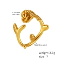 Macro shot of gold-plated rose flower ring showing 7.4mm floral head and steel texture - Gold-Thorn Rose