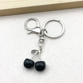 Silver keychain with elegant black cherry pendant and polished metal lobster clasp - ER868-Black Cherry