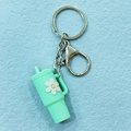 Mint green PVC cup keychain with white daisy pattern and silver metal clasp - Keychain / Mint Green Flower Cup Keychain