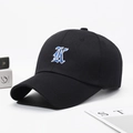 Black baseball cap with blue vintage K embroidery and pre-curved brim for casual wear - Adjustable / Black