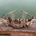 Close-up of raw brown crystal crown with silver wire moon and stag head details - Brown