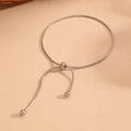 Detail of adjustable silver snake chain bracelet with sliding bolo clasp and metal beads - Cross Drawstring Bracelet (C606)