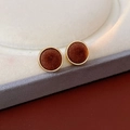 Macro shot of brown flocked round stud earrings in gold base on velvet jewelry box - 925 Silver Earring Post / Golden Coffee Round
