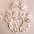 Detail of cream baby socks and headband set with delicate lace bows for infant photography - (White) Lace Bow Set