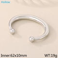 Gepolijste zilveren C-vormige holle roestvrijstalen armband met bolvormige uiteinden van 62mm - Staalkleur