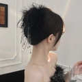Detail of black feather hair clip with sparkling rhinestone tassel and crystal droplet - Black